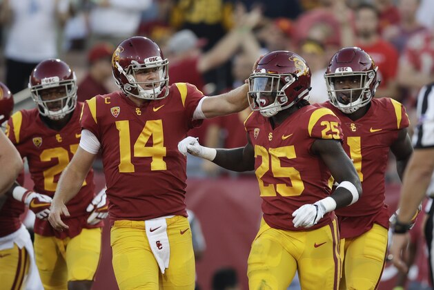 Southern California running back Ronald Jones II, right, is congratulated by quarterback Sam Darnold after scoring a touchdown during the first half of an NCAA college football game against Stanford, Saturday, Sept. 9, 2017, in Los Angeles. (AP Photo/Jae C. Hong)