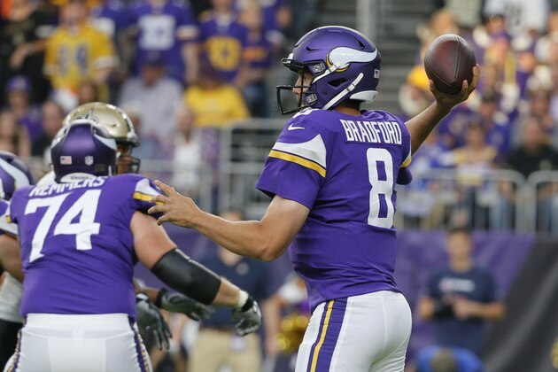 Minnesota Vikings quarterback Sam Bradford throws a pass during the first half of an NFL football game against the New Orleans Saints, Monday, Sept. 11, 2017, in Minneapolis. (AP Photo/Bruce Kluckhohn)
