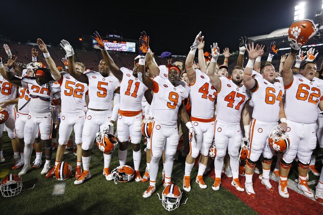 LOUISVILLE, KY - SEPTEMBER 16: Clemson Tigers players celebrate after the game against the Louisville Cardinals at Papa John's Cardinal Stadium on September 16, 2017 in Louisville, Kentucky. Clemson won 47-21. (Photo by Joe Robbins/Getty Images)
