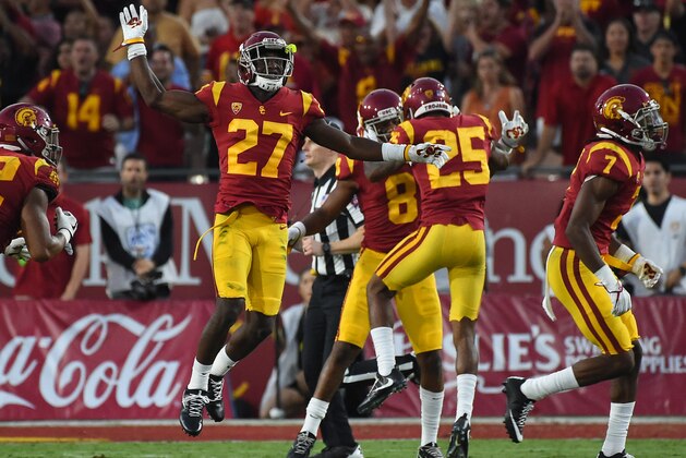 Sep 16, 2017; Los Angeles, CA, USA;  USC Trojans cornerback Ajene Harris (27) celebrates a stoppage on 3rd down in the first half of the game against the Texas Longhorns at Los Angeles Memorial Coliseum. Mandatory Credit: Jayne Kamin-Oncea-USA TODAY Sports