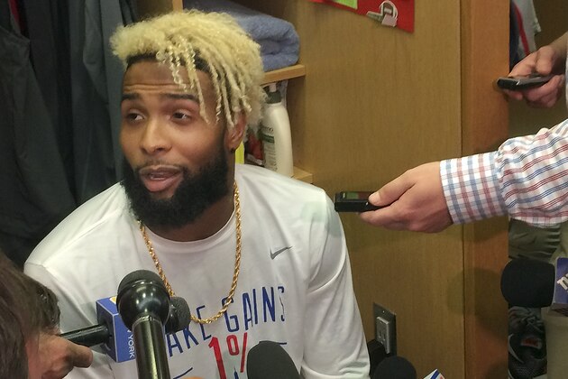 New York Giants wide receiver Odell Beckham Jr. speaks with reporters in the locker room at  NFL football team's training facility, Thursday, Sept. 14, 2017, in East Rutherford, N.J. Beckham, who has not practiced since spraining his ankle in a preseason game on Aug. 21, took the next step in his recovery from a sprained left ankle by participating in the individual segment of practice. (AP Photo/Tom Canavan)
