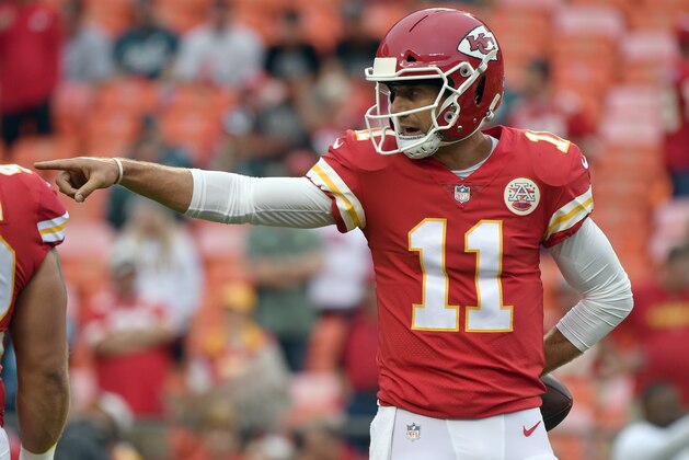 Kansas City Chiefs quarterback Alex Smith (11) point before an NFL football game against the Philadelphia Eagles in Kansas City, Mo., Sunday, Sept. 17, 2017. (AP Photo/Ed Zurga)