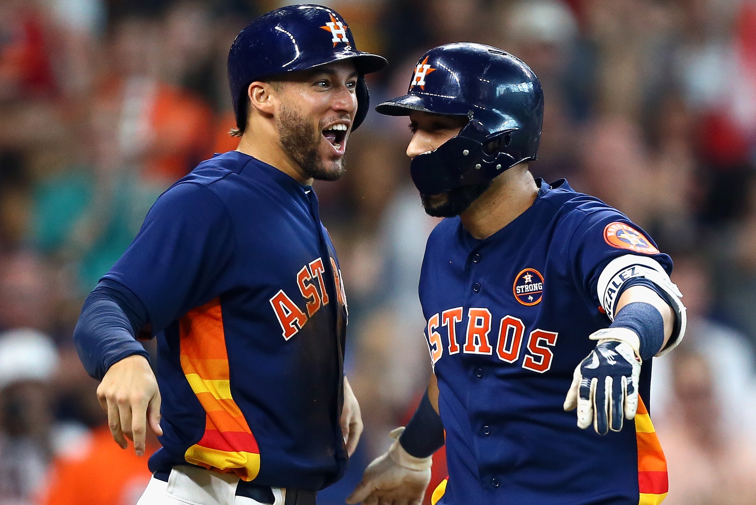 HOUSTON, TX - SEPTEMBER 17:  Marwin Gonzalez #9 of the Houston Astros receives congratulations from George Springer #4 after hitting a home run in the fifth inning against the Seattle Mariners at Minute Maid Park on September 17, 2017 in Houston, Texas.  (Photo by Bob Levey/Getty Images)