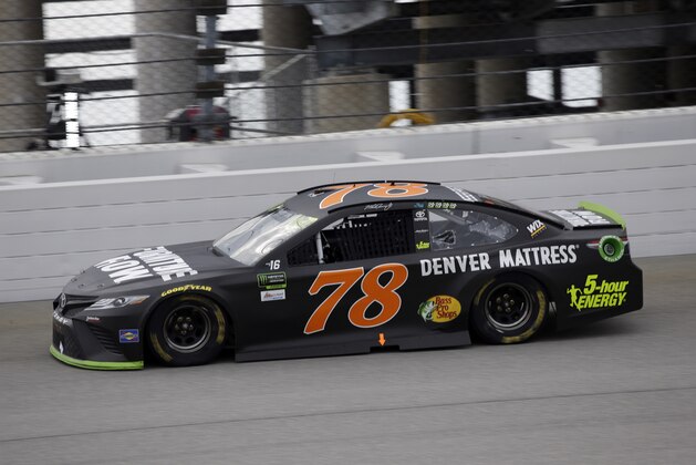 Martin Truex Jr., drives during the NASCAR Cup auto race at Chicagoland Speedway in Joliet, Ill., Sunday, Sept. 17, 2017. (AP Photo/Nam Y. Huh)