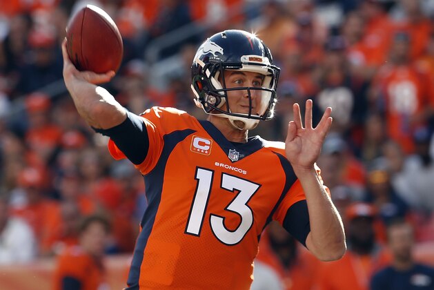 Denver Broncos quarterback Trevor Siemian (13) throws against the Dallas Cowboys during the first half of an NFL football game, Sunday, Sept. 17, 2017, in Denver. (AP Photo/Joe Mahoney)