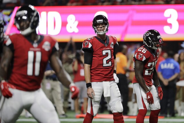 Atlanta Falcons quarterback Matt Ryan (2) works against the Green Bay Packers during the first of an NFL football game, Sunday, Sept. 17, 2017, in Atlanta. (AP Photo/David Goldman)