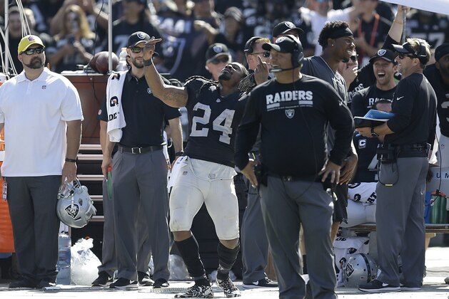 Oakland Raiders running back Marshawn Lynch (24) dances on the sideline during the second half of an NFL football game against the New York Jets in Oakland, Calif., Sunday, Sept. 17, 2017. (AP Photo/Ben Margot)