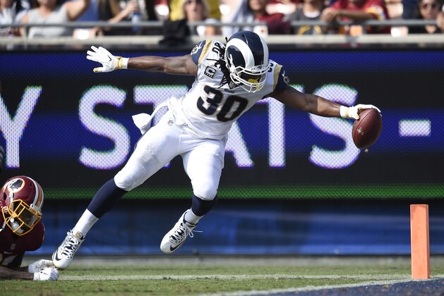 Los Angeles Rams running back Todd Gurley scores against the Washington Redskins during the second half of an NFL football game Sunday, Sept. 17, 2017, in Los Angeles. (AP Photo/Kelvin Kuo)