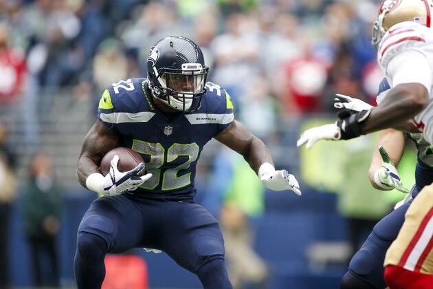 Sep 17, 2017; Seattle, WA, USA; Seattle Seahawks running back Chris Carson (32) rushes against the San Francisco 49ers during the first quarter at CenturyLink Field. Mandatory Credit: Joe Nicholson-USA TODAY Sports