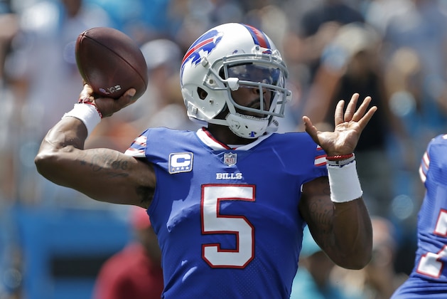 Buffalo Bills' Tyrod Taylor (5) looks to pass against the Carolina Panthers in the first half of an NFL football game in Charlotte, N.C., Sunday, Sept. 17, 2017. (AP Photo/Bob Leverone)