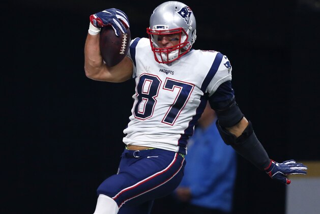 New England Patriots tight end Rob Gronkowski (87) celebrates his touchdown in the first half of an NFL football game against the New Orleans Saints in New Orleans, Sunday, Sept. 17, 2017. (AP Photo/Butch Dill)