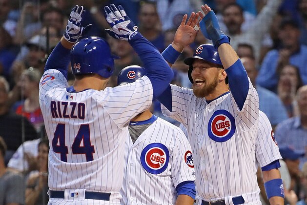CHICAGO, IL - AUGUST 16:  Anthony Rizzo #44 of the Chicago Cubs is greeted by Ben Zobrist #18 (R), Kyle Schwarber #12 and Kris Bryant #17 after hitting a grand slam home run in the 1st inning against the Cincinnati Reds at Wrigley Field on August 16, 2017 in Chicago, Illinois.  (Photo by Jonathan Daniel/Getty Images)