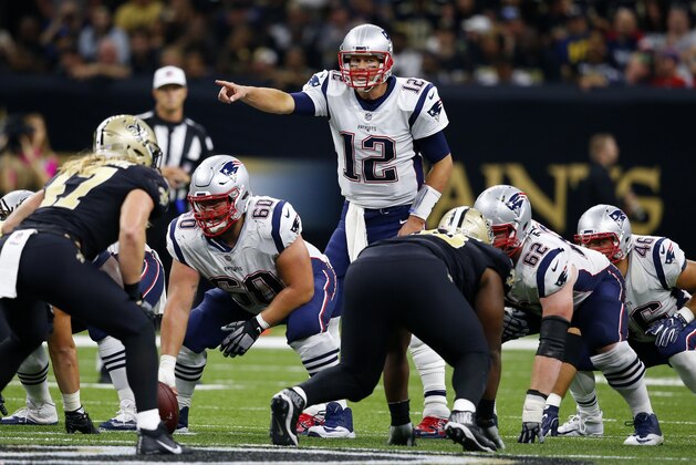 New England Patriots quarterback Tom Brady (12) calls an audible from the line of scrimmage in the second half of an NFL football game against the New Orleans Saints in New Orleans, Sunday, Sept. 17, 2017. (AP Photo/Butch Dill)