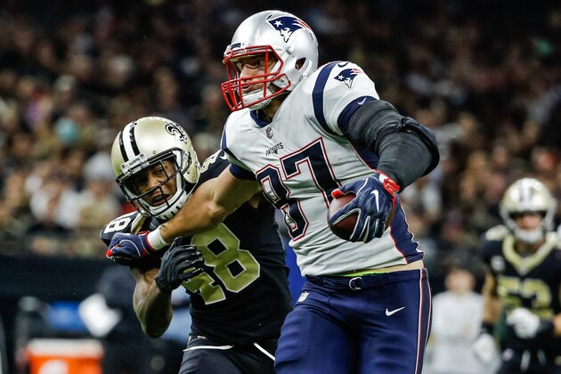Sep 17, 2017; New Orleans, LA, USA; New England Patriots tight end Rob Gronkowski (87) is tackled by New Orleans Saints safety Vonn Bell (48) during the second half of a game at the Mercedes-Benz Superdome. The Patriots defeated the Saints 36-20.  Mandatory Credit: Derick E. Hingle-USA TODAY Sports