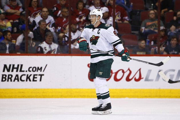Minnesota Wild's Mikko Koivu heads back to the bench during a shift change against the Arizona Coyotes during the second period of an NHL hockey game Saturday, April 8, 2017, in Glendale, Ariz. The Wild defeated the Coyotes 3-1. (AP Photo/Ross D. Franklin)