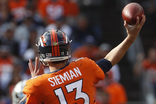 Denver Broncos quarterback Trevor Siemian (13) throws against the Dallas Cowboys during the first half of an NFL football game, Sunday, Sept. 17, 2017, in Denver. (AP Photo/Joe Mahoney)