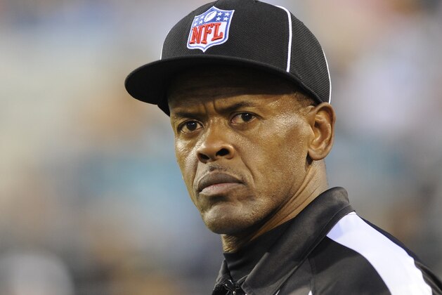 JACKSONVILLE, FL - AUGUST 9: Line judge Carl Johnson checks play as the Jacksonville Jaguars host the Atlanta Falcons at Jacksonville Municipal Stadium on August 9, 2008 in Jacksonville, Florida.   (Photo by Al Messerschmidt/Getty Images)
