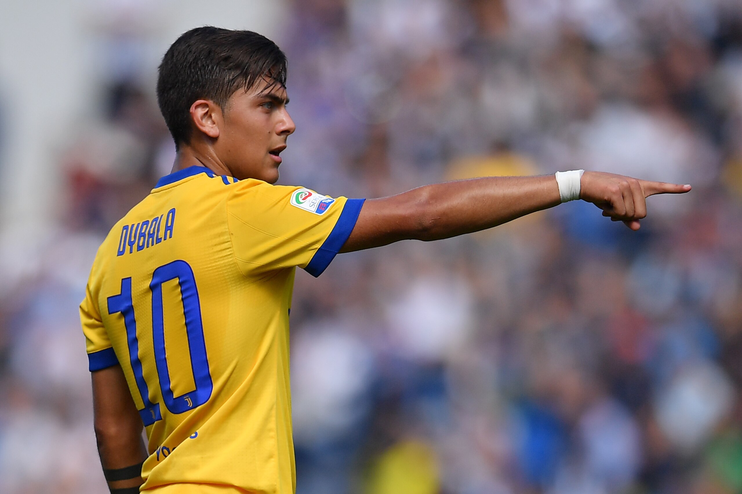 Juventus' Argentinian forward Paulo Dybala gestures during the Italian Serie A football match Sassuolo versus Juventus on September 17, 2017 at the Mapei Stadium in Reggio Emilia.  / AFP PHOTO / MARCO BERTORELLO        (Photo credit should read MARCO BERTORELLO/AFP/Getty Images)