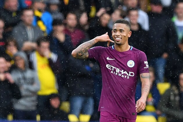 Manchester City's Brazilian striker Gabriel Jesus celebrates scoring the team's third goal during the English Premier League football match between Watford and Manchester City at Vicarage Road Stadium in Watford, north of London on September 16, 2017. / AFP PHOTO / Ben STANSALL / RESTRICTED TO EDITORIAL USE. No use with unauthorized audio, video, data, fixture lists, club/league logos or 'live' services. Online in-match use limited to 75 images, no video emulation. No use in betting, games or single club/league/player publications.  /         (Photo credit should read BEN STANSALL/AFP/Getty Images)