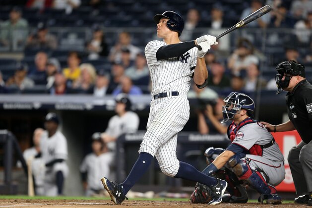 NEW YORK, NY - SEPTEMBER 18:  Aaron Judge #99 of the New York Yankees watches his solo homerun in the bottom of the first inning against the Minnesota Twins on September 18, 2017 at Yankee Stadium in the Bronx borough of New York City. (Photo By Christopher Pasatieri/Getty Images)