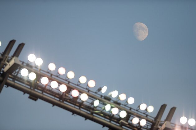 DENVER, CO - SEPTEMBER 1:  The moon is visible along with stadium lights in a general view during a game between the Colorado Buffaloes and the Colorado State Rams at Sports Authority Field at Mile High on September 1, 2017 in Denver, Colorado.  (Photo by Dustin Bradford/Getty Images)