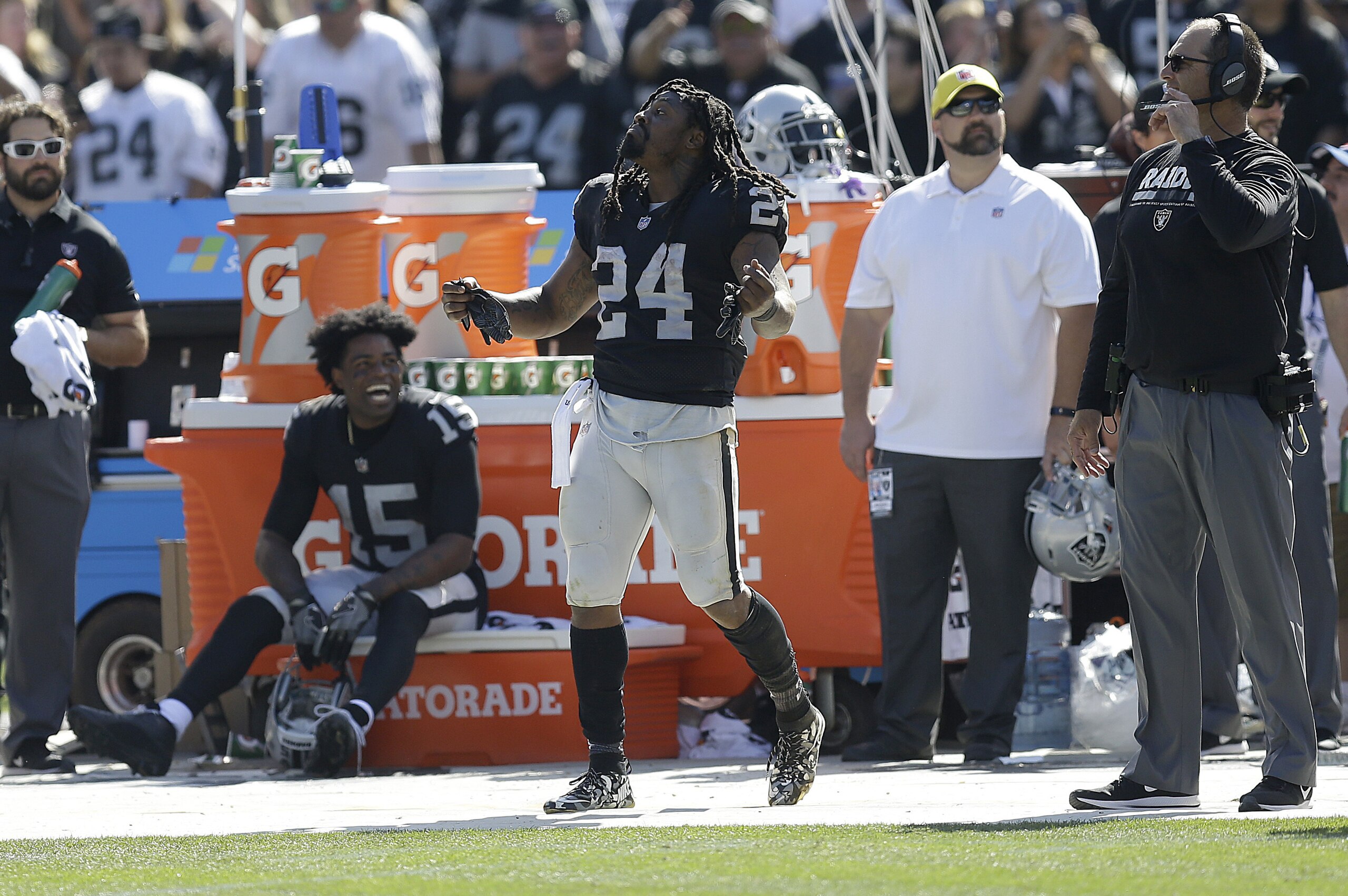 Oakland Raiders running back Marshawn Lynch (24) dances on the sideline during the second half of an NFL football game against the New York Jets in Oakland, Calif., Sunday, Sept. 17, 2017. (AP Photo/Ben Margot)