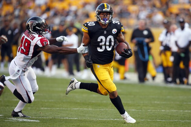 PITTSBURGH, PA - AUGUST 20:  James Conner #30 of the Pittsburgh Steelers rushes against the Atlanta Falcons during a preseason game at Heinz Field on August 20, 2017 in Pittsburgh, Pennsylvania.  (Photo by Justin K. Aller/Getty Images)