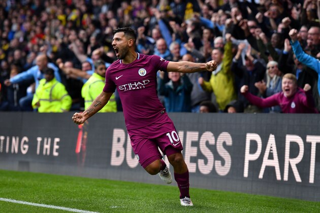 Manchester City's Argentinian striker Sergio Aguero celebrates scoring  his third and the team's fifth goal during the English Premier League football match between Watford and Manchester City at Vicarage Road Stadium in Watford, north of London on September 16, 2017. / AFP PHOTO / Ben STANSALL / RESTRICTED TO EDITORIAL USE. No use with unauthorized audio, video, data, fixture lists, club/league logos or 'live' services. Online in-match use limited to 75 images, no video emulation. No use in betting, games or single club/league/player publications.  /         (Photo credit should read BEN STANSALL/AFP/Getty Images)