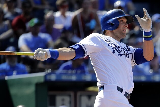 Kansas City Royals' Alex Gordon hits a three-run home run during the eighth inning of the first baseball game of a doubleheader against the Minnesota Twins, Saturday, July 1, 2017, in Kansas City, Mo. (AP Photo/Charlie Riedel)
