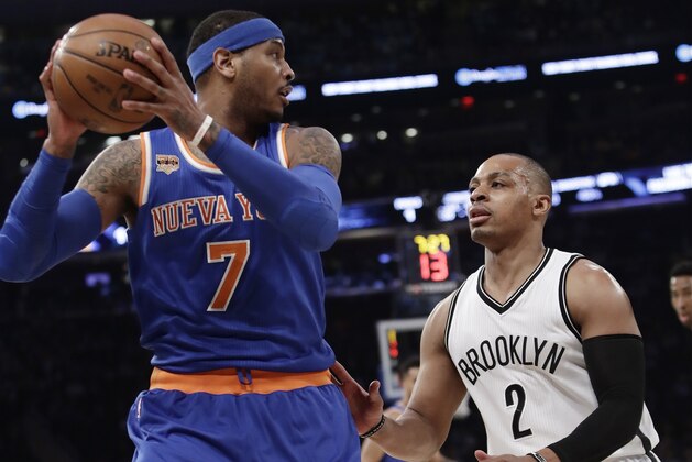 Brooklyn Nets' Randy Foye (2) defends New York Knicks' Carmelo Anthony (7) during the first half of an NBA basketball game Thursday, March 16, 2017, in New York. (AP Photo/Frank Franklin II)