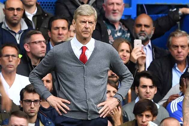 Arsenal's French manager Arsene Wenger looks on from the touchline during the English Premier League football match between Chelsea and Arsenal at Stamford Bridge in London on September 17, 2017. / AFP PHOTO / Ben STANSALL / RESTRICTED TO EDITORIAL USE. No use with unauthorized audio, video, data, fixture lists, club/league logos or 'live' services. Online in-match use limited to 75 images, no video emulation. No use in betting, games or single club/league/player publications.  /         (Photo credit should read BEN STANSALL/AFP/Getty Images)