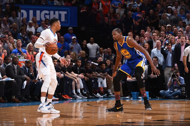 OKLAHOMA CITY, OK - FEBRUARY 11: Russell Westbrook #0 of the Oklahoma City Thunder handles the ball against Kevin Durant #35 of the Golden State Warriors on February 11, 2017 at Chesapeake Energy Arena in Oklahoma City, Oklahoma. NOTE TO USER: User expressly acknowledges and agrees that, by downloading and or using this photograph, User is consenting to the terms and conditions of the Getty Images License Agreement. Mandatory Copyright Notice: Copyright 2017 NBAE (Photo by Andrew D. Bernstein/NBAE via Getty Images) OKLAHOMA CITY, OK - FEBRUARY 11: Russell Westbrook #0 of the Oklahoma City Thunder handles the ball against Kevin Durant #35 of the Golden State Warriors on February 11, 2017 at Chesapeake Energy Arena in Oklahoma City, Oklahoma. NOTE TO USER: User expressly acknowledges and agrees that, by downloading and or using this photograph, User is consenting to the terms and conditions of the Getty Images License Agreement. Mandatory Copyright Notice: Copyright 2017 NBAE (Photo by Andrew D. Bernstein/NBAE via Getty Images)