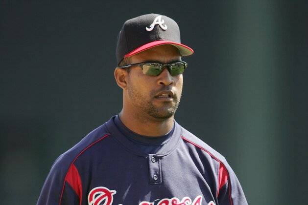 KISSIMMEE, FL - MARCH 4:  Outfielder Raul Mondesi #43 of the Los Angeles Dodgers looks on against the Atlanta Braves during MLB Spring Training action at Cracker Jack Stadium on March 4, 2005 in Kissimmee, Florida. The Braves defeated the Dodgers 3-2. (Photo by Doug Pensinger/Getty Images)