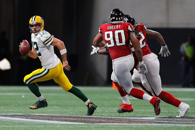 ATLANTA, GA - SEPTEMBER 17:  Aaron Rodgers #12 of the Green Bay Packers scrambles with the football during the second half against the Atlanta Falcons at Mercedes-Benz Stadium on September 17, 2017 in Atlanta, Georgia.  (Photo by Kevin C. Cox/Getty Images)