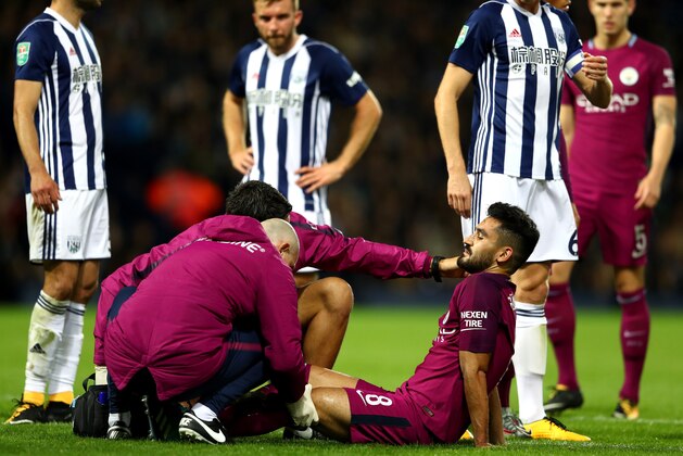 WEST BROMWICH, ENGLAND - SEPTEMBER 20:  Ilkay Gundogan of Manchester City receives treatment from the medical team during the Carabao Cup Third Round match between West Bromwich Albion and Manchester City at The Hawthorns September 20, 2017 in West Bromwich, England.  (Photo by Michael Steele/Getty Images)