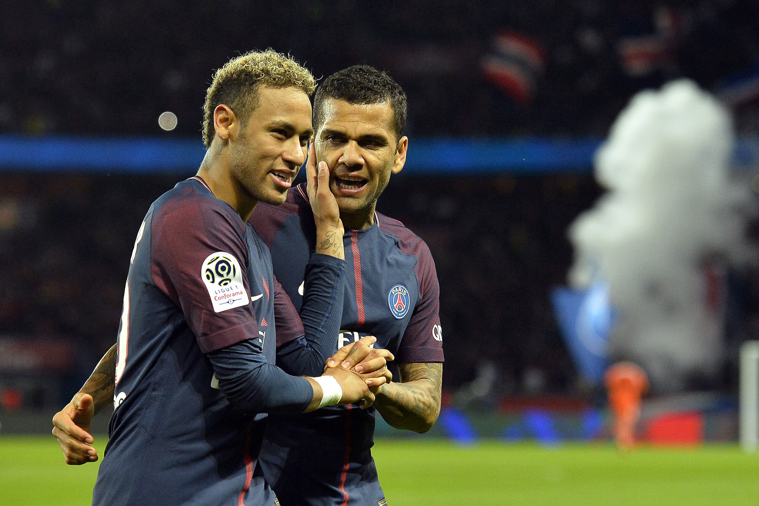 PARIS, FRANCE - SEPTEMBER 17:  Neymar Jr and Dani Alves of Paris Saint-Germain react after Kylian Mbappe scored during the Ligue 1 match between Paris Saint Germain and Olympique Lyonnais  at Parc des Princes on September 17, 2017 in Paris, .  (Photo by Aurelien Meunier/Getty Images)