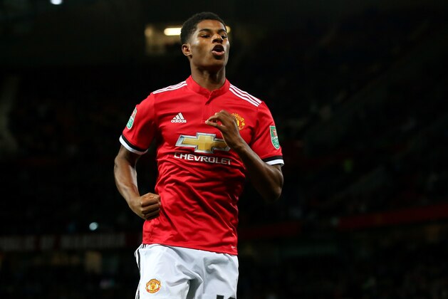 MANCHESTER, ENGLAND - SEPTEMBER 20: Marcus Rashford of Manchester United celebrates scoring his sides first goal during the Carabao Cup Third Round match between Manchester United and Burton Albion at Old Trafford on September 20, 2017 in Manchester, England.  (Photo by Alex Livesey/Getty Images)