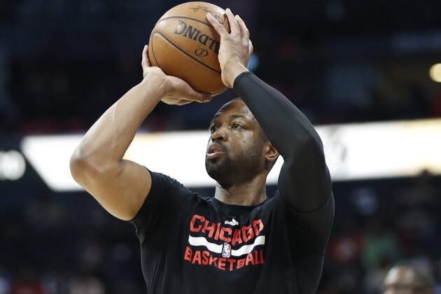 Chicago Bulls guard Dwyane Wade (3) warms up before an NBA basketball game against the Atlanta Hawks Friday, Jan. 20, 2017, in Atlanta. (AP Photo/John Bazemore)