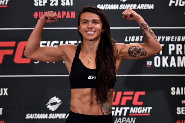 TOKYO, JAPAN - SEPTEMBER 21:  Claudia Gadelha of Brazil steps on the scale during the UFC Fight Night Weigh-in at the Hilton Tokyo on September 21, 2017 in Tokyo, Japan. (Photo by Jeff Bottari/Zuffa LLC/Zuffa LLC via Getty Images)