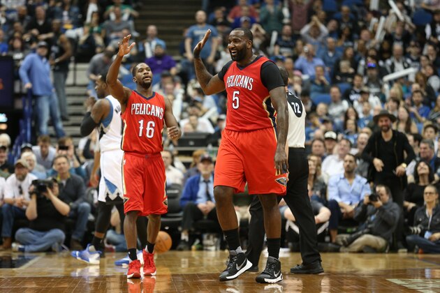 MINNEAPOLIS, MN -  APRIL 13:  Toney Douglas #16 and Kendrick Perkins #5 of the New Orleans Pelicans celebrate against the Minnesota Timberwolves on April 13, 2016 at Target Center in Minneapolis, Minnesota. NOTE TO USER: User expressly acknowledges and agrees that, by downloading and or using this Photograph, user is consenting to the terms and conditions of the Getty Images License Agreement. Mandatory Copyright Notice: Copyright 2016 NBAE (Photo by Jordan Johnson/NBAE via Getty Images)