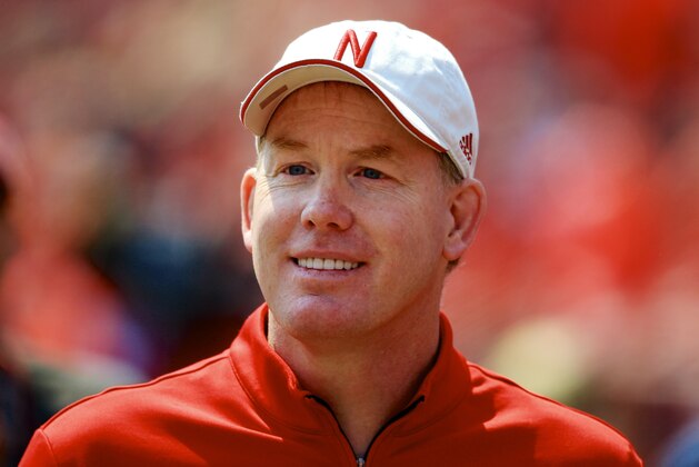 FILE - In this April 11, 2015 file photo, Nebraska Athletic Director Shawn Eichorst stands on the sidelines during a football game in Lincoln, Neb. The NCAA committee that crafted proposed football recruiting reforms, which includes the addition of early signing periods, wants to create more transparency and access for coaches and players in a process that has been accelerated in recent years, said a key member of the group. Eichorst told The Associated Press the football oversight committee created an interconnected and comprehensive package of reforms while acknowledging the new realities of recruiting. (AP Photo/Nati Harnik, File)