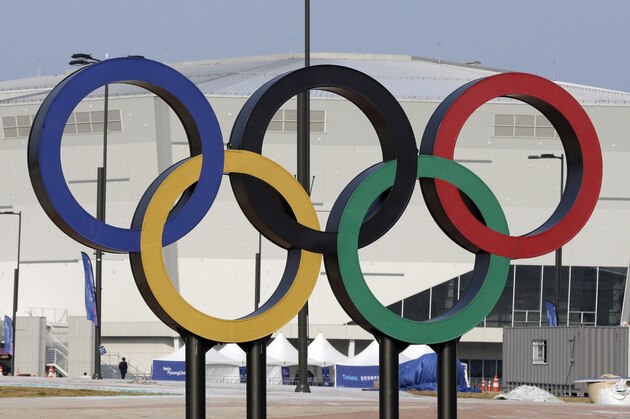 FILE - In this April 4, 2017, file photo, Olympic rings are seen in front of Gangneung Hockey Center in Gangneung, South Korea. With five months to go before the opening ceremony of the Pyeongchang Winter Olympics, organizers are desperate to sell more tickets in a country where the Games have failed to dominate national conversation amid an upheaval in domestic politics and a torrent of North Korean missile launches. (AP Photo/Ahn Young-joon, File)