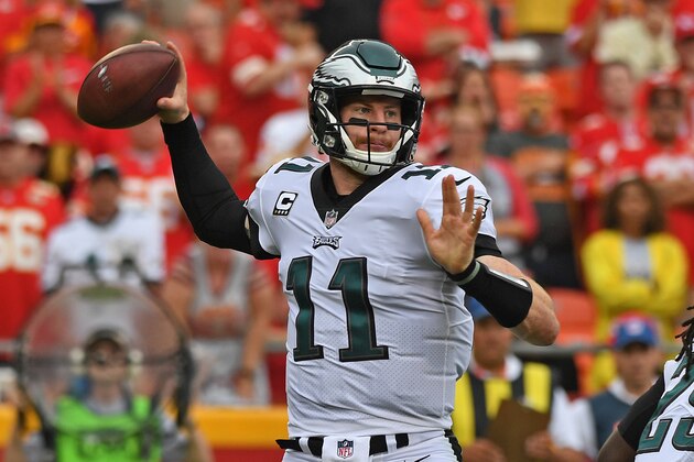 KANSAS CITY, MO - SEPTEMBER 17:  Quarterback Carson Wentz #11 of the Philadelphia Eagles drops back to pass against of the Kansas City Chiefs during the second half on September 17, 2017 at Arrowhead Stadium in Kansas City, Missouri.  (Photo by Peter G. Aiken/Getty Images)