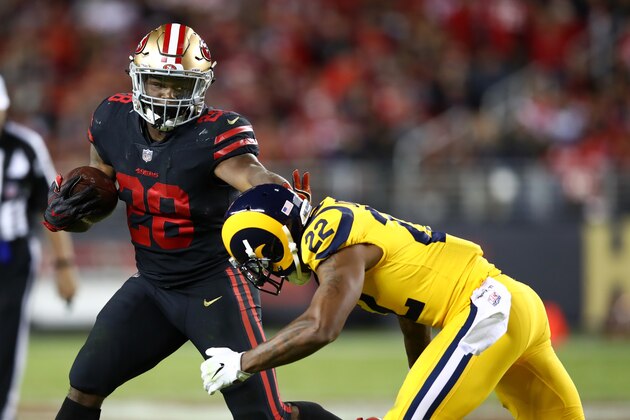 SANTA CLARA, CA - SEPTEMBER 21:  Carlos Hyde #28 of the San Francisco 49ers rushes against the Los Angeles Rams during their NFL game at Levi's Stadium on September 21, 2017 in Santa Clara, California.  (Photo by Ezra Shaw/Getty Images)