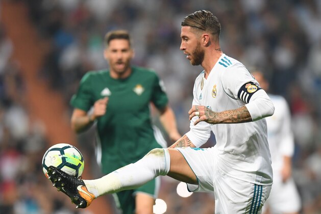 Real Madrid's defender from Spain Sergio Ramos controls the ball during the Spanish league football match Real Madrid CF against Real Betis  at the Santiago Bernabeu stadium in Madrid on September 20, 2017. / AFP PHOTO / GABRIEL BOUYS        (Photo credit should read GABRIEL BOUYS/AFP/Getty Images)