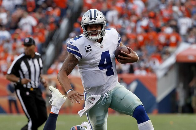 Denver Broncos outside linebacker Von Miller (58) can't reach Dallas Cowboys quarterback Dak Prescott (4) during the second half of an NFL football game, Sunday, Sept. 17, 2017, in Denver. (AP Photo/Jack Dempsey)