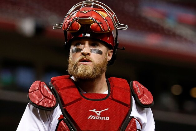 CINCINNATI, OH - SEPTEMBER 5:  Tucker Barnhart #16 of the Cincinnati Reds walks off of the field at the end of an inning during the game against the Milwaukee Brewers at Great American Ball Park on September 5, 2017 in Cincinnati, Ohio. Cincinnati defeated Milwaukee 9-3. (Photo by Kirk Irwin/Getty Images)