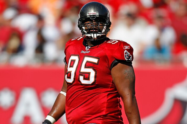 TAMPA, FL - NOVEMBER 13:  Defensive tackle Albert Haynesworth #95 of the Tampa Bay Buccaneers walks back to the huddle against the Houston Texans during the game at Raymond James Stadium on November 13, 2011 in Tampa, Florida.  (Photo by J. Meric/Getty Images)
