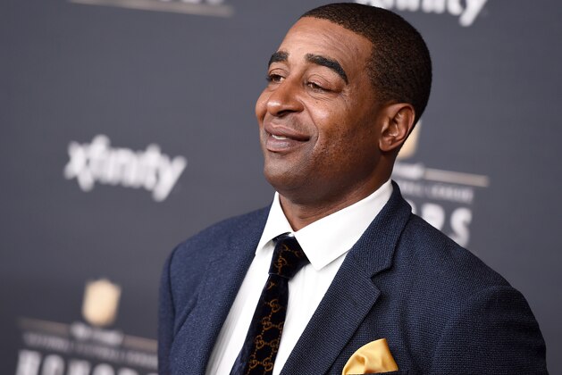 Former NFL player Cris Carter arrives at the 4th annual NFL Honors at the Phoenix Convention Center Symphony Hall on Saturday, Jan. 1, 2015. (Photo by Jordan Strauss/Invision for NFL/AP Images)