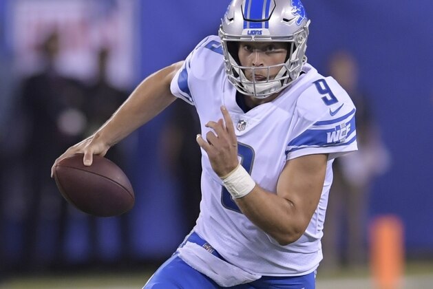 Detroit Lions quarterback Matt Stafford (9) rushes during the first half of an NFL football game against the New York Giants Monday, Sept. 18, 2017, in East Rutherford, N.J. (AP Photo/Bill Kostroun)
